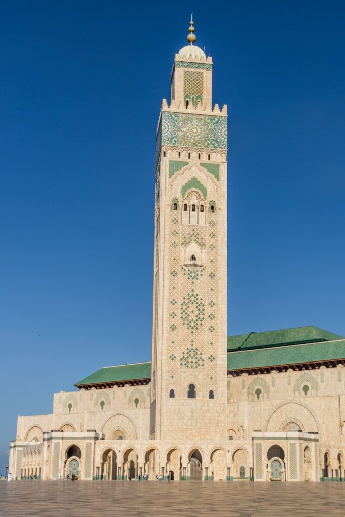 a very tall building with a clock on it's side